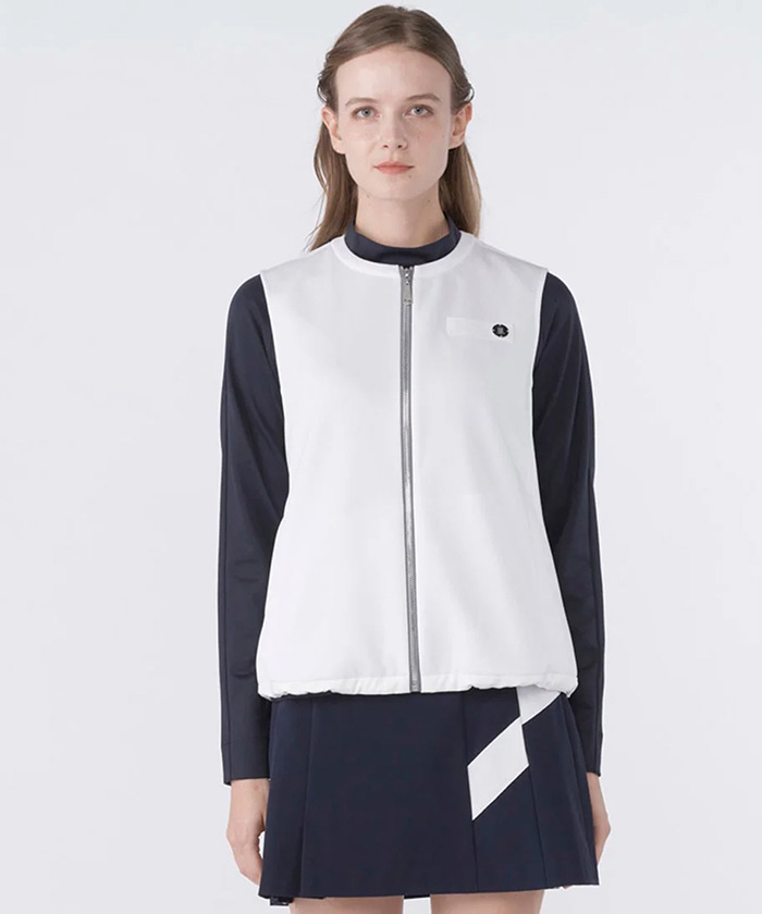 丸みのあるシルエットが特徴のノーカラー前開きカットソーベストです。
随所に配されたグログランテープのディテールが、高級感とスポーティなアクセントを添え、プレゼントにもおすすめです。