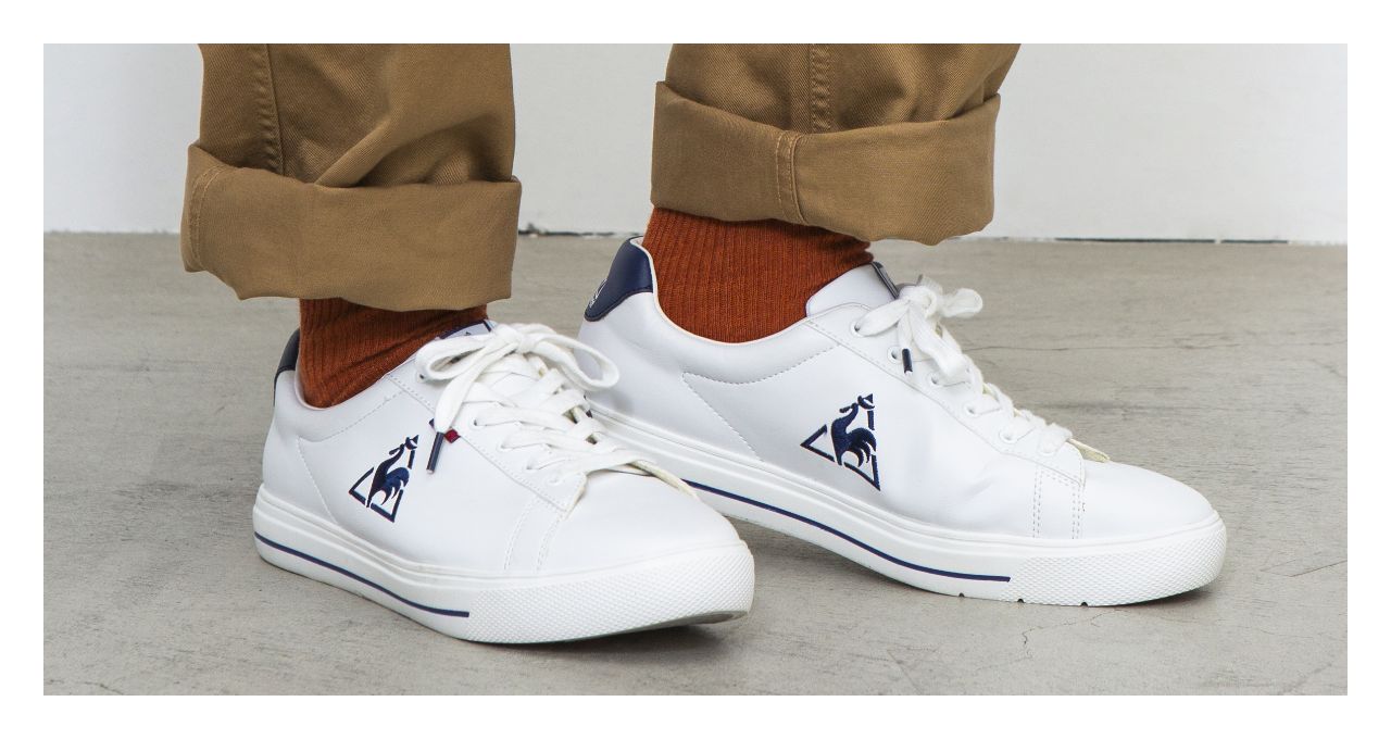 美品 I E Coq Sportif Vライン濃紺 グレー 光沢有り ライン蛍光色 蛍光色オレンジ ロゴグレートップス サイズl クーポン対象外